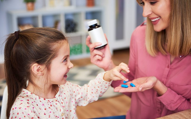 Smiling child in language therapy